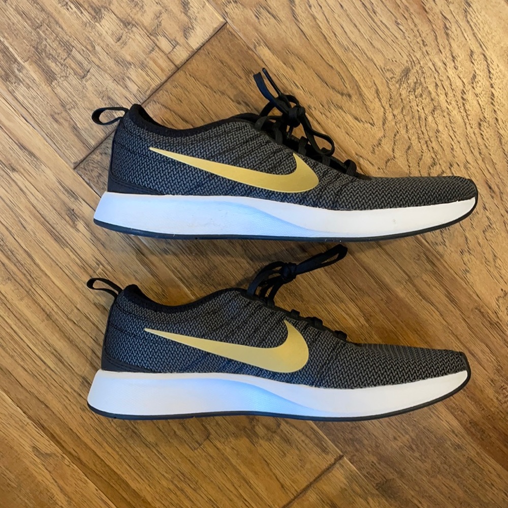 Nike black and gold dual tone racer sneakers